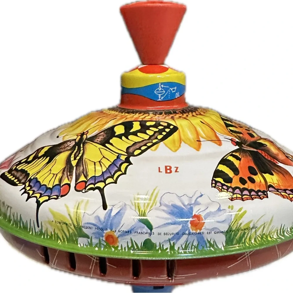VTG RARE LBZ LORENZ BOLZ ZINDORF TIN TOP FLOWER BUTTERFLY W GERMANY BOLZ TOYS 8”